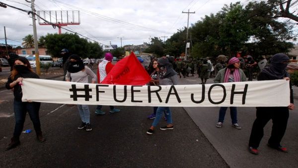protestantes_en_tegucigalpa_marchan_en_contra_del_presidente_hondurexo_el_20_de_enero_de_2018_-_reuters